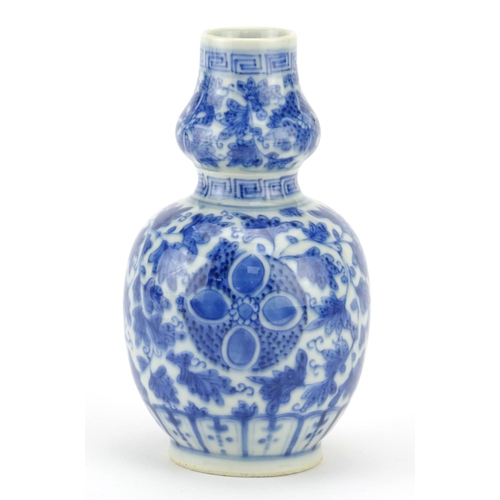 271 - Chinese blue and white porcelain double gourd vase, hand painted with flowers, 15.5cm high