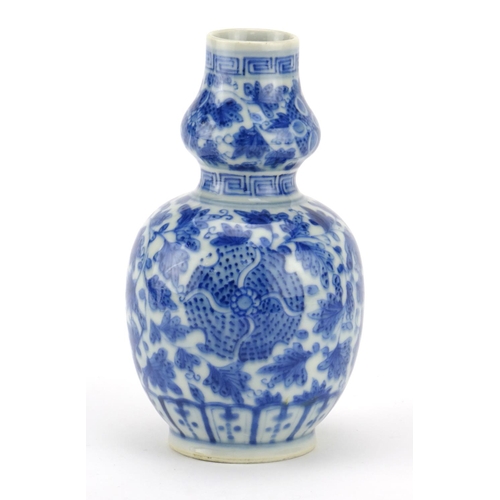 271 - Chinese blue and white porcelain double gourd vase, hand painted with flowers, 15.5cm high