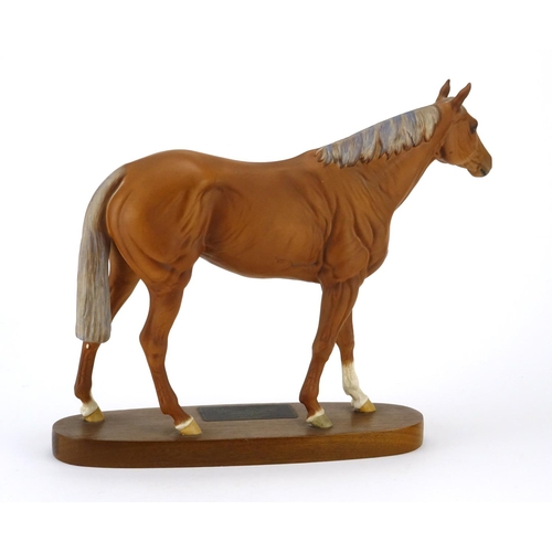 2177 - Beswick model of Grundy, racehorse of the year, raised on an oval wood stand, 29cm high