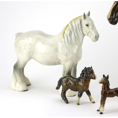 2404 - Five Beswick horses including Dapple Grey shire horse, the largest 27cm high