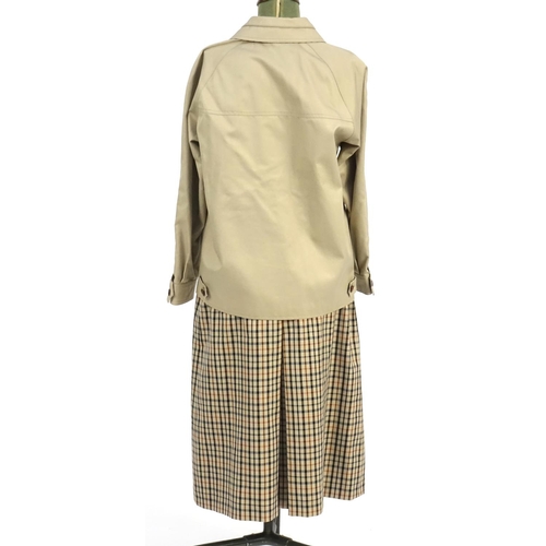 2467 - 1970's Daks tartan design skirt suit, size 32 and 35
