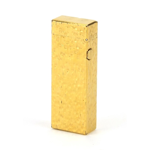2528 - Dunhill gold plated bark design pocket lighter, 6.5cm high