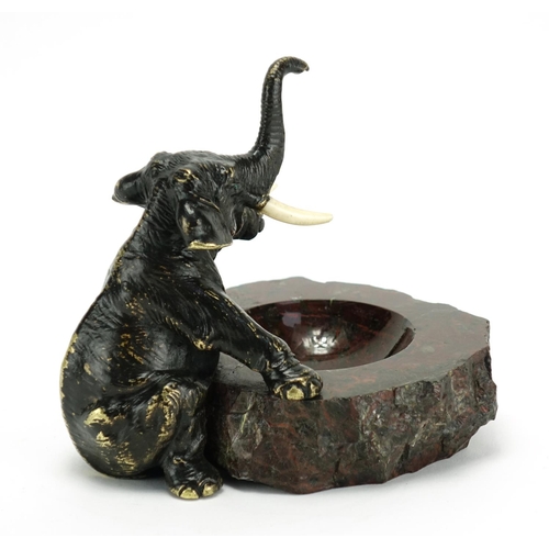 2186 - Japanese patinated bronze elephant and serpentine marble pin dish, 15.5cm high
