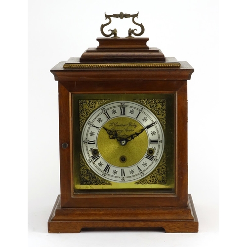 2356 - Walnut Westminster chiming mantel clock, the brass dial inscribed Landseer Bailey Regent Square of B... 