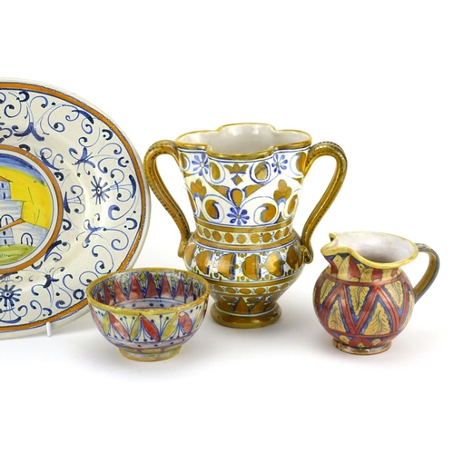 2240 - Italian Majolica pottery including a twin handled lustre cup, lustre bowl and an oval dish hand pain... 