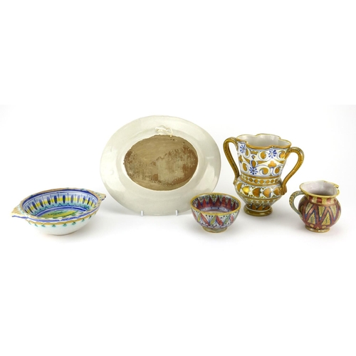 2240 - Italian Majolica pottery including a twin handled lustre cup, lustre bowl and an oval dish hand pain... 