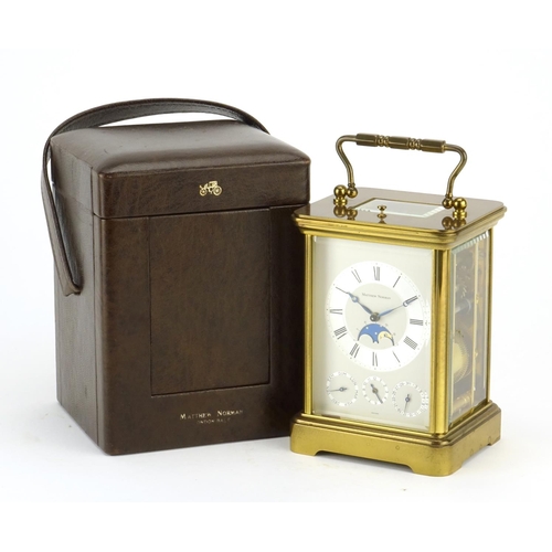 814 - Matthew Norman brass cased repeating carriage clock, with moon phase and four dials, the silvered ch... 