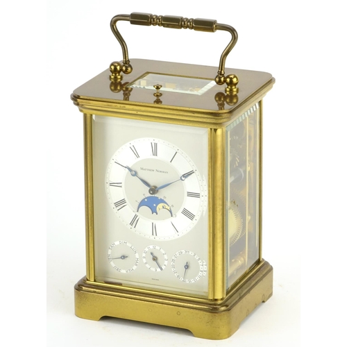 814 - Matthew Norman brass cased repeating carriage clock, with moon phase and four dials, the silvered ch... 