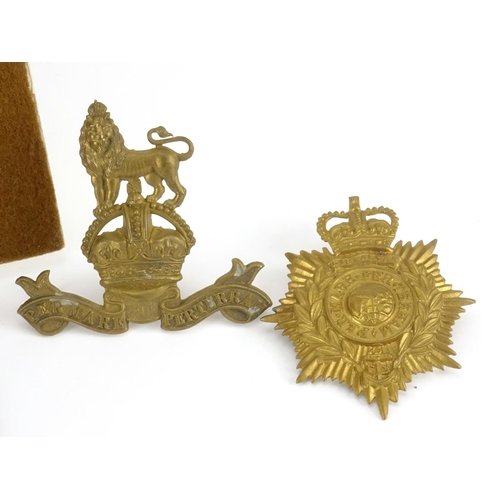 212 - British Militaria including Royal Marine helmet plate, The Kings own badges and pips