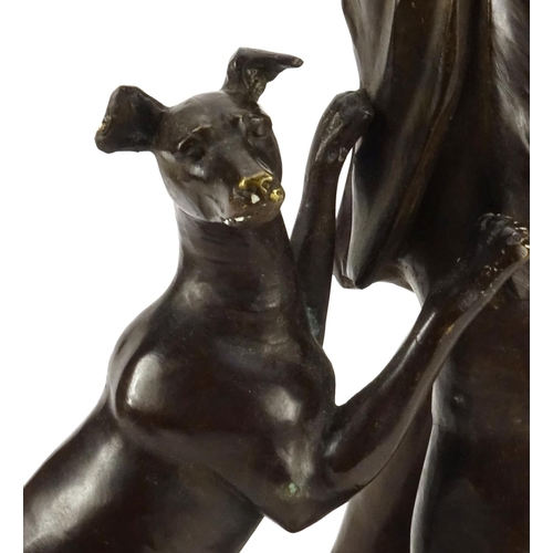 2 - Large floor standing patinated bronze figure of a young female with a dog, 76.5cm high