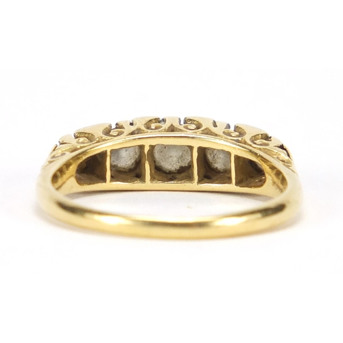 672 - 18ct gold diamond five stone ring, size P, approximate weight 4.6g, housed in a Bentley & Skinner to... 