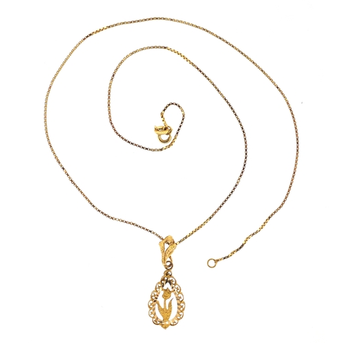 724 - 17ct gold flower pendant on an unmarked gold necklace, the pendant 3.2cm in length, approximate weig... 