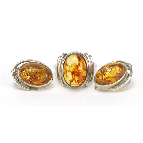 264 - Silver and natural amber ring and matching earrings