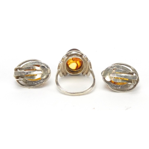 264 - Silver and natural amber ring and matching earrings