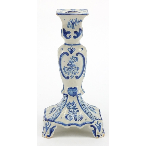 86 - Delft tin glazed blue and white pottery candlestick, 25cm high