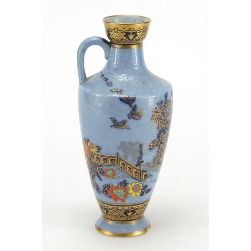 604 - Mandarin porcelain ewer hand painted in the chinoiserie manner, 21.5cm high