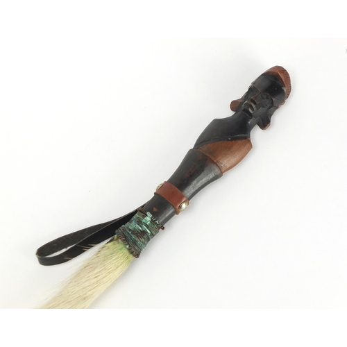 796 - African fly swish, with carved wood figural handle