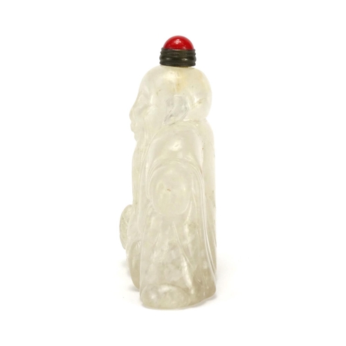 2540 - Chinese carved rock crystal snuff bottle in the form of an elder with coral stopper, 8cm high