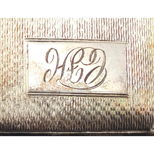 2589 - Rectangular silver cigarette case with engine turned decoration, hallmarked Birmingham 1937, 8.5cm i... 