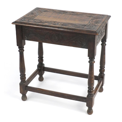 15 - Carved oak occasional table raised on baluster turned legs, 73cm H x 68cm W x 44cm D