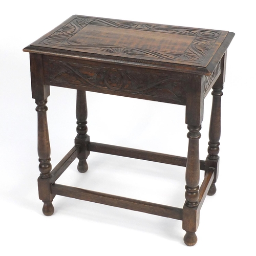 15 - Carved oak occasional table raised on baluster turned legs, 73cm H x 68cm W x 44cm D