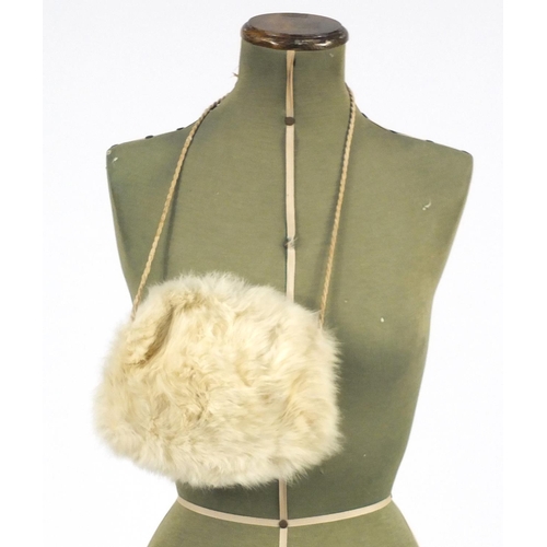 561 - Child's cream fur coat, hat and handbag