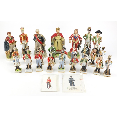 107 - Mostly Military porcelain figures the largest 21cm high