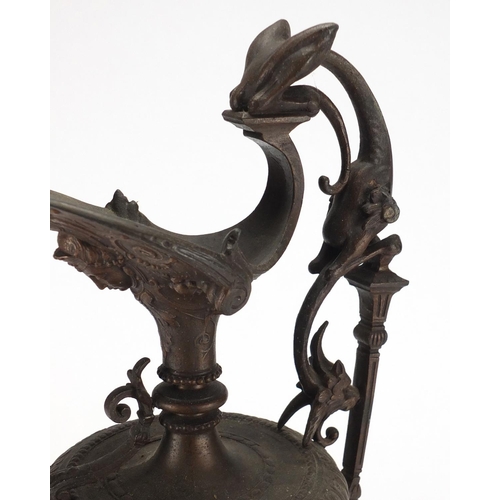 17 - 19th century cast iron Neoclassical design ewer on stand, cast with classical figures, urns and foli... 