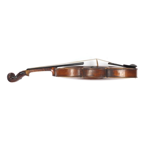87 - Old wooden violin with one piece back, two bows and fitted wooden case, the violin back 14.5inches i... 