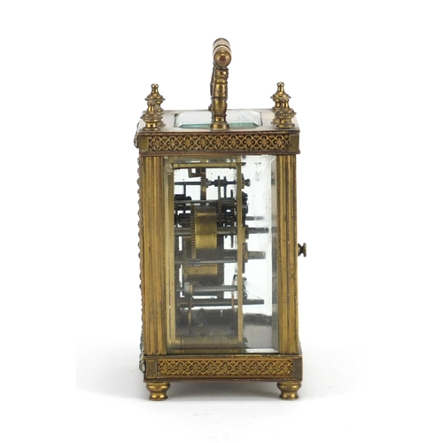 816 - French brass cased jewelled carriage clock, with blind fret panel, the enamelled dials with Arabic n... 