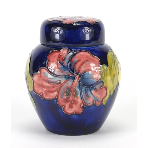 527 - Moorcroft pottery jar and cover, hand painted and tube lined in the anemone pattern, impressed marks... 