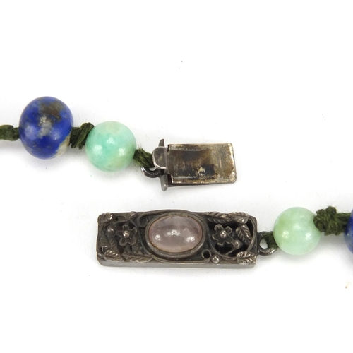 340 - Chinese polished stone bead necklace with green jade ball pendant and silver clasp impressed silver,... 