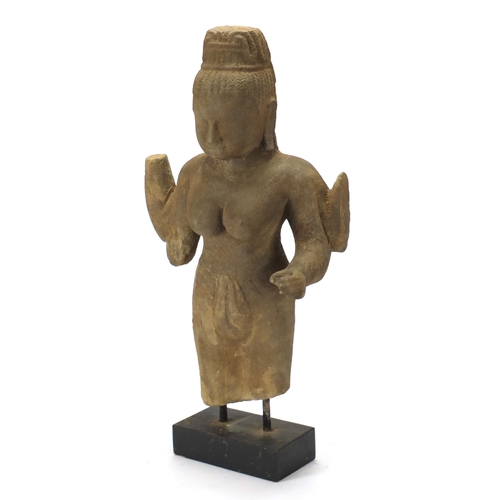383 - Asian stone carving of a female, possibly Grand Tour, raised on a wooden stand, 53cm high