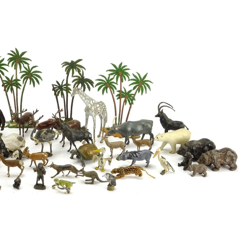 247 - Predominantly Britains hand painted lead zoo animals and cage posts including a cheetah and baboon, ... 