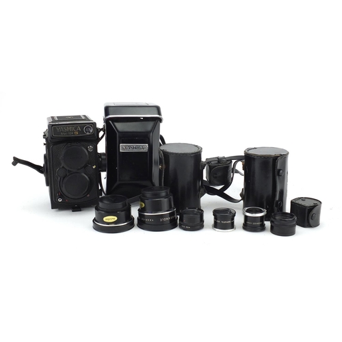 107 - Yascica Mat-124 G camera with lenses and leather cases