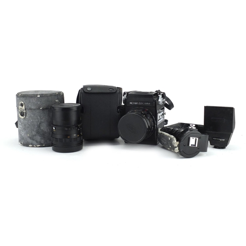 105 - Kowa Six MM camera with 1:3.5/55mm and 1:2.8/85 lenses, accessories and cases