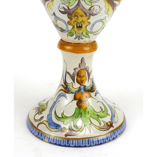 425 - Italian Majolica ewer in the style of Cantagalli, hand painted with putti and griffins, 66.5cm high