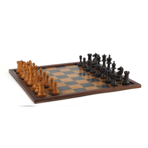 258 - Boxwood chess set with mahogany chessboard, the largest chess piece 8cm high
