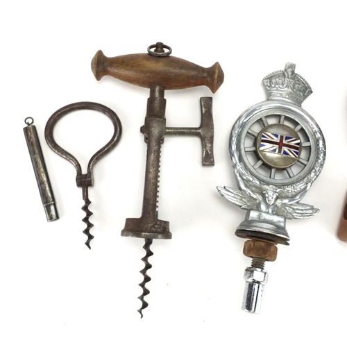 65 - Antique and later objects including a steel corkscrew, silver pencil holder, black forest nut cracke... 