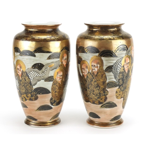 312 - Pair of Japanese Satsuma pottery vases, hand painted with sages and dragons, each 22cm high