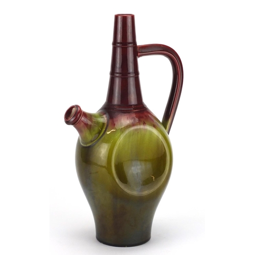 506 - Christopher Dresser design Linthorpe pottery ewer having a red and green dripping glaze, impressed 4... 