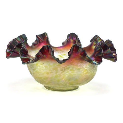 493 - Large purple iridescent glass bowl with frilled rim in the style of Loetz, 35cm in diameter