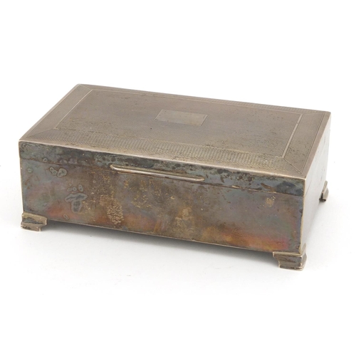620 - Rectangular silver cigar box, the hinged lid with engine turned decoration, by A. T & Son, Birmingha... 