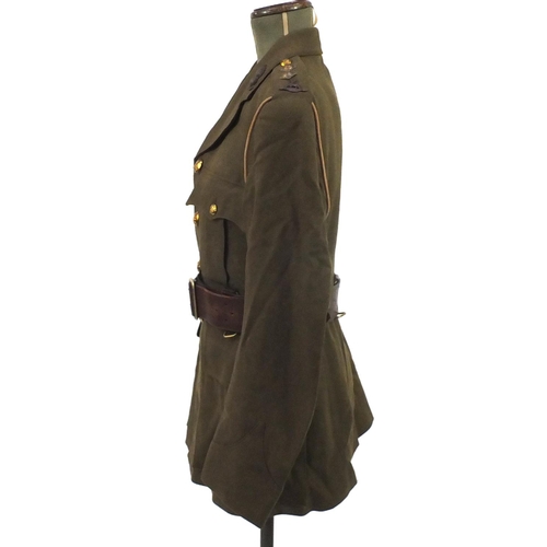 227 - British Military World War II uniform including tunics and a leather swagger stick