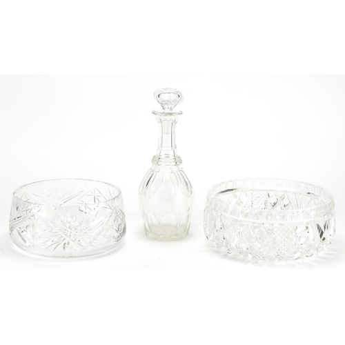 348 - Two cut crystal fruit bowls and a decanter, the largest 22.5cm in diameter