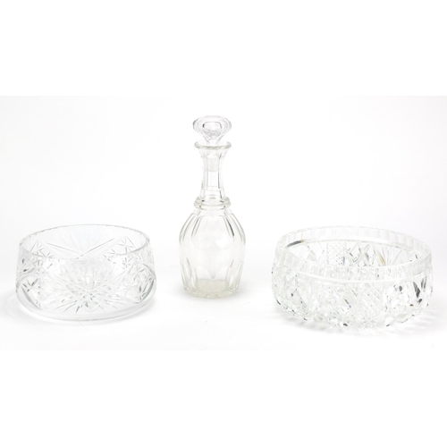 348 - Two cut crystal fruit bowls and a decanter, the largest 22.5cm in diameter