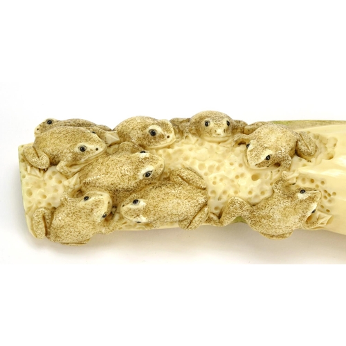 353 - Japanese carved ivory okimono of a group of frogs, character marks to the base, 13.5cm wide