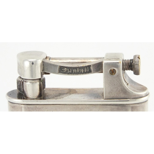 69 - Dunhill silver plated table lighter, 10.5cm high