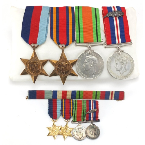 739 - Four British Military World War II medals and dress medals, with oak leaf mentioned in despatches