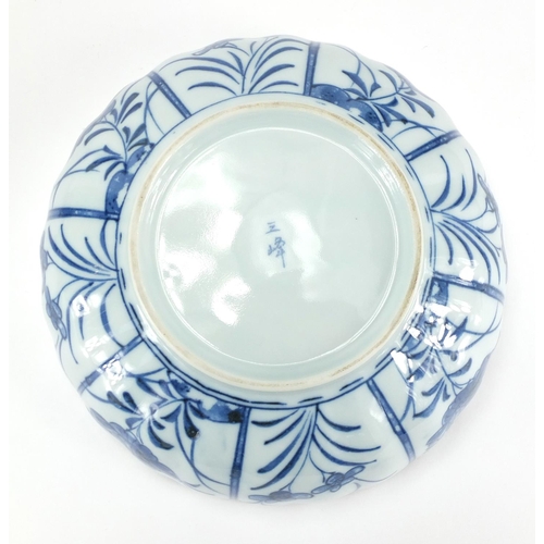 586 - Chinese porcelain egg decorated with figures and a blue and white porcelain bowl